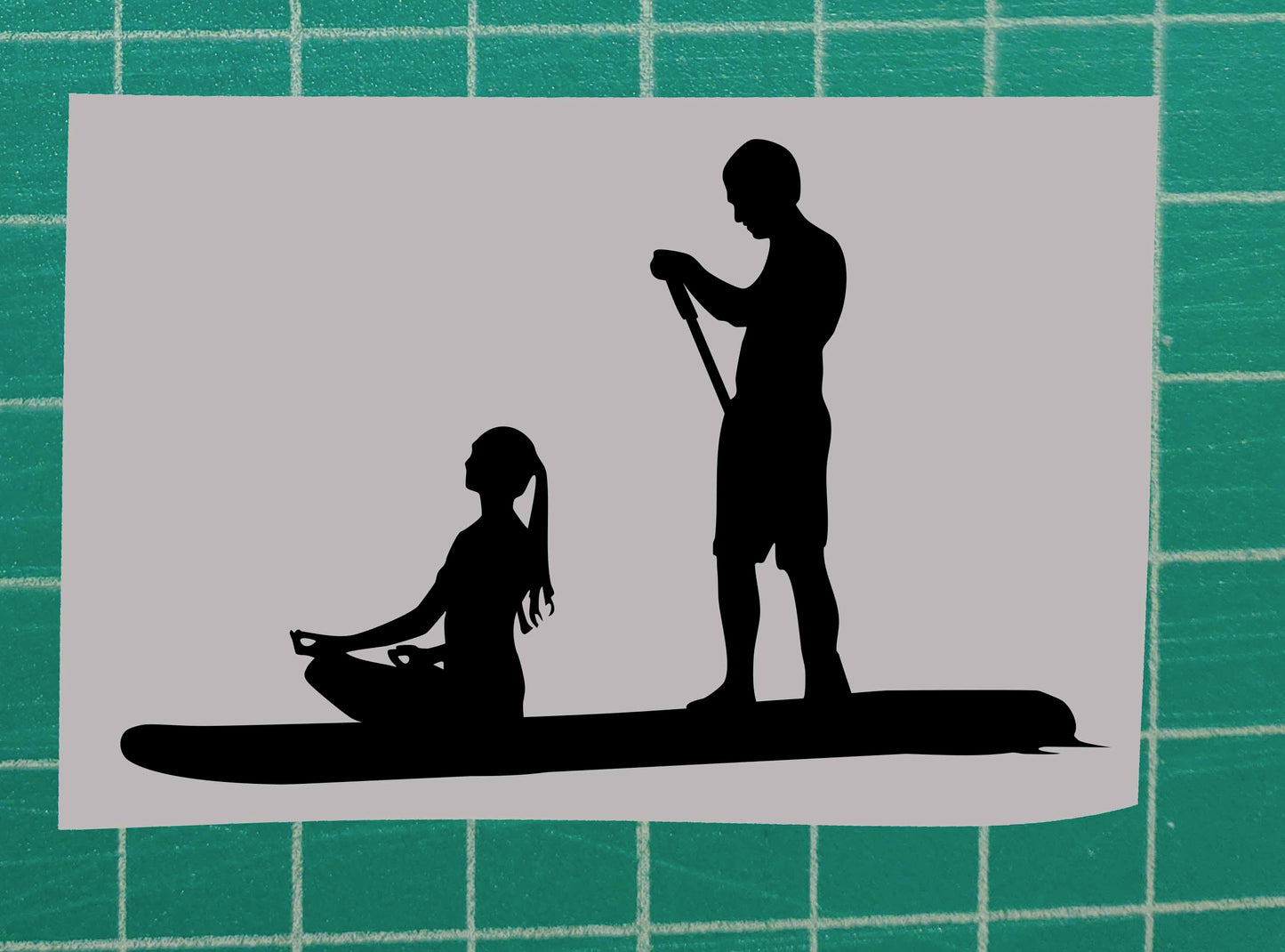 Silhouette of Couple Paddleboarding (SUP)