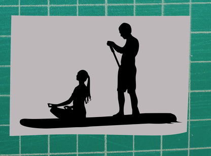Silhouette of Couple Paddleboarding (SUP)