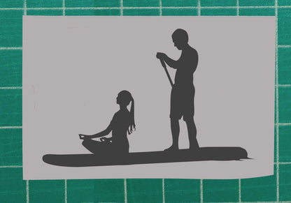 Silhouette of Couple Paddleboarding (SUP)